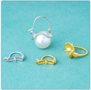 Macro shot of S925 sterling silver ear hoops for DIY pearl earrings in gold and silver