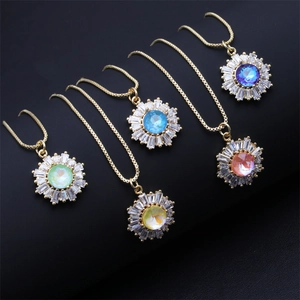 Copper sunflower necklaces with multicolor zircon crystals on a dark background