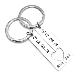 Custom stainless steel couple keychain set with date engraving and heart puzzle design
