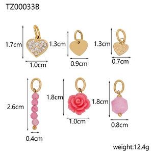 Detailed view of heart charms and pink flower pendants with exact size measurements