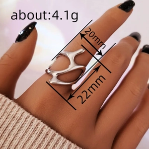 Irregular silver hollow out liquid style ring with futuristic minimalist design
