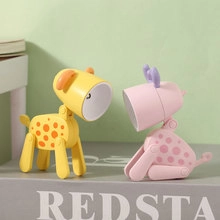 Dettaglio delle mini lampade da tavolo a LED pieghevoli a forma di coniglio e giraffa
