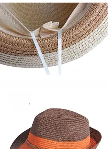 Detail of hand-woven straw hat showing adjustable inner drawstring and bicolor texture