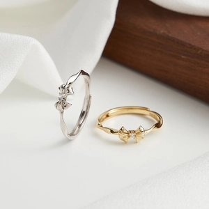 Elegant S925 sterling silver bow ring with sparkling zircon and twisted rope band