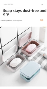 Detail of three wall-mounted double-layer soap boxes in pink, white, and blue colors
