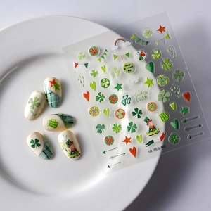 Detailed view of 5D St. Patrick's Day nail stickers with green clover and lucky charms