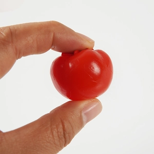 Stress-relief PVC mini tomato keychain with slow rebound soft squeeze feature