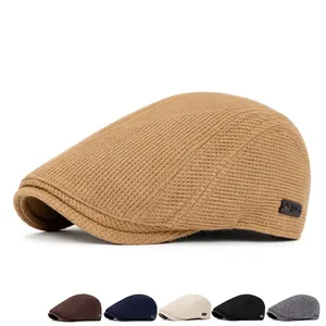 Classic khaki knit beret cap for men with honeycomb texture and side brand label