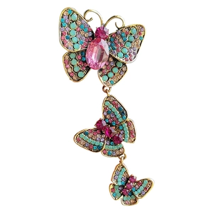 Elegant gold butterfly brooch with multicolor rhinestones and pink gemstone for party suit