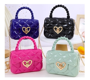 Mini jelly bags in vibrant colors with diamond quilt texture and heart metal buckles