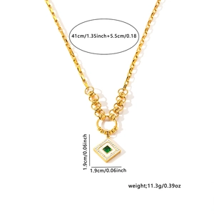 Close-up of gold titanium necklace with green square gem pendant and size dimensions