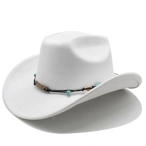 Detail of white suede cowboy hat with turquoise beads and antique bronze metal accents