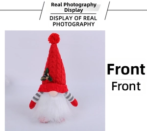 Macro detail of Christmas gnome figurine with red knitted hat and white faux fur beard