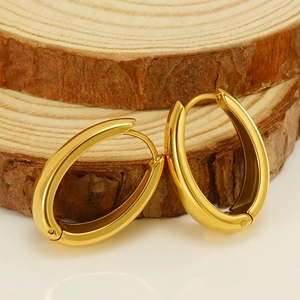 Boucles d'oreilles ovales dorées en acier inoxydable poli avec un fermoir à charnière