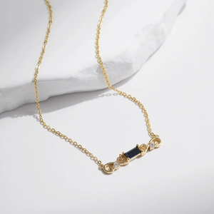Vintage S925 silver necklace featuring blue rectangular gemstone on white stone