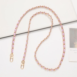 Detail of lavender leather woven in gold chain strap with metallic lobster hooks