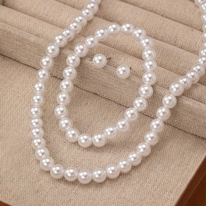 Elegant 8mm white pearl jewelry set including necklace, bracelet and stud earrings