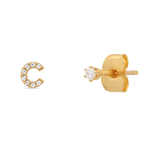 Detail of gold letter C stud earring with pavé zircon and single crystal solitaire