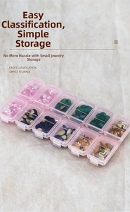 Detail view of a 12-grid pink transparent PP storage box with individual lids for nail art