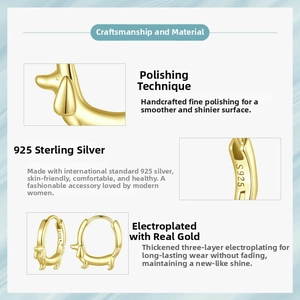 Detailed macro view showing the S925 sterling silver hallmark and polished gold finish
