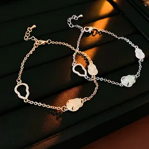 Golden and silver zircon gourd bracelet set with hollow cloud pendants and lobster clasps