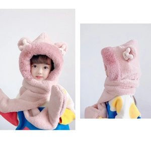 Detail of pink plush hooded scarf for girls with fuzzy faux fur texture and cute ears