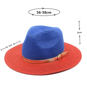 Detail view of two-tone straw hat with dimensions 56-58cm head girth and 7cm brim width