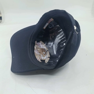 Black cotton baseball cap with interior tiger embroidery and metal adjustment buckle
