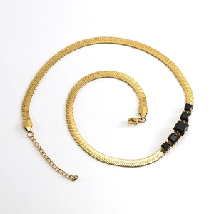 Gold plated stainless steel flat snake chain necklace with four black zircon stones