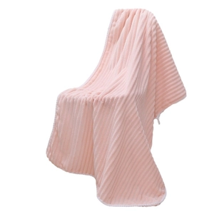 Pink striped coral fleece towel set with soft ribbed texture shown against a white background