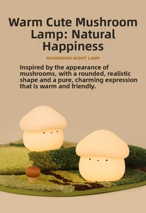 Close-up of soft silicone mushroom night lights on green forest moss background