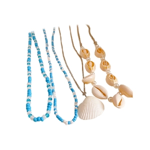 5-piece bohemian beaded necklace set with seashells and light blue beads for beach vacation