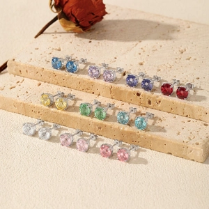Sparkling S925 silver stud earrings with multi-color zircon gemstones on a stone base