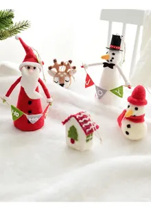 Detailed view of wool felt Christmas ornaments including Santa, reindeer and snowman