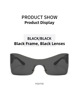 Front view of Y2K rimless wrap sunglasses with dark lenses and gold nose bridge