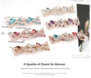Detailed set of butterfly hair clips with sparkling multi-color rhinestones and alloy base