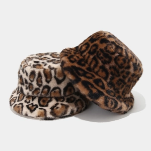 Chic faux fur bucket hats with stylish leopard patterns in cream and caramel tones
