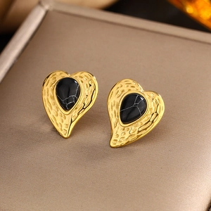 Vintage gold heart studs with black turquoise inlay and twisted rope edge details