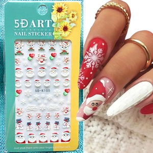 Detailed 5D Christmas nail stickers with Santa and reindeer on nails and in packaging