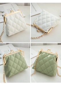 Detail of quilted mini coin purses with metal kiss-lock closure and gold chain straps