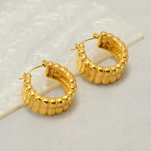 Minimalist gold U-shaped stainless steel earrings with textured ridged design for women