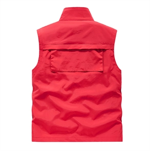 Rear view of red outdoor utility vest featuring a large functional back pocket