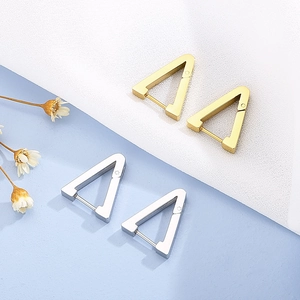 Detailed comparison of geometric triangle hoop earrings in gold and silver stainless steel