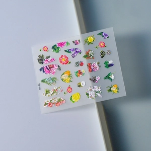 Detailed macro of 3D embossed colorful floral nail art stickers with model TS-163