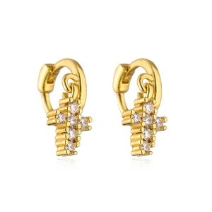 Macro shot of 18K gold plated cross earrings featuring sparkling white zircon stones