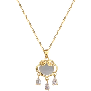 Elegant gold necklace with cat eye stone lock pendant and sparkling zircon droplets