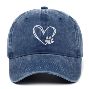 Vintage washed denim blue baseball cap with white heart and paw embroidery detail