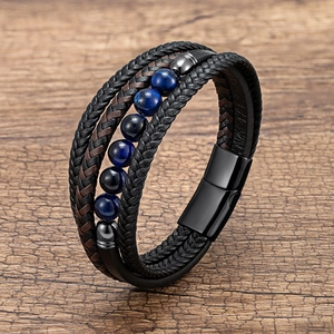 Detailed macro view of multi-layer braided leather bracelet with blue natural stone beads