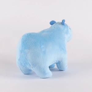 Detail view of a soft blue capybara plush toy in a standing pose with smooth texture