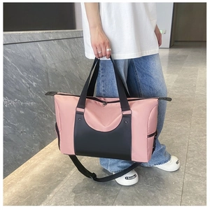 Durable pink and black sports bag with large capacity and waterproof nylon material